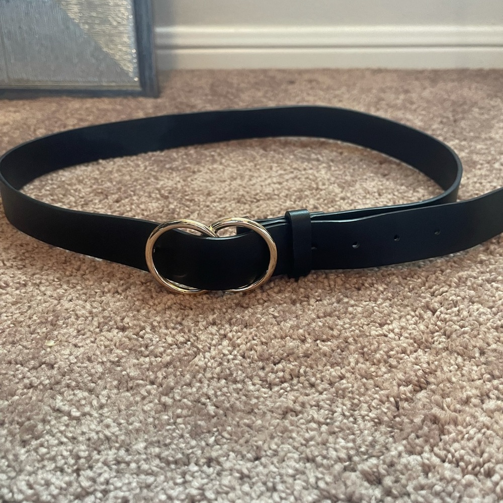 Women’s black leather belt with gold buckle